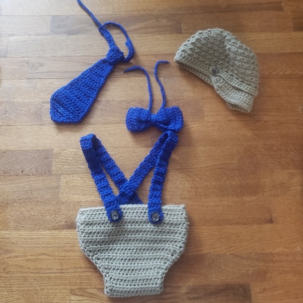 Beige diaper cover with blue‎ suspenders